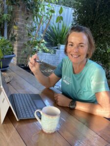 Bec outside doing AI webinars